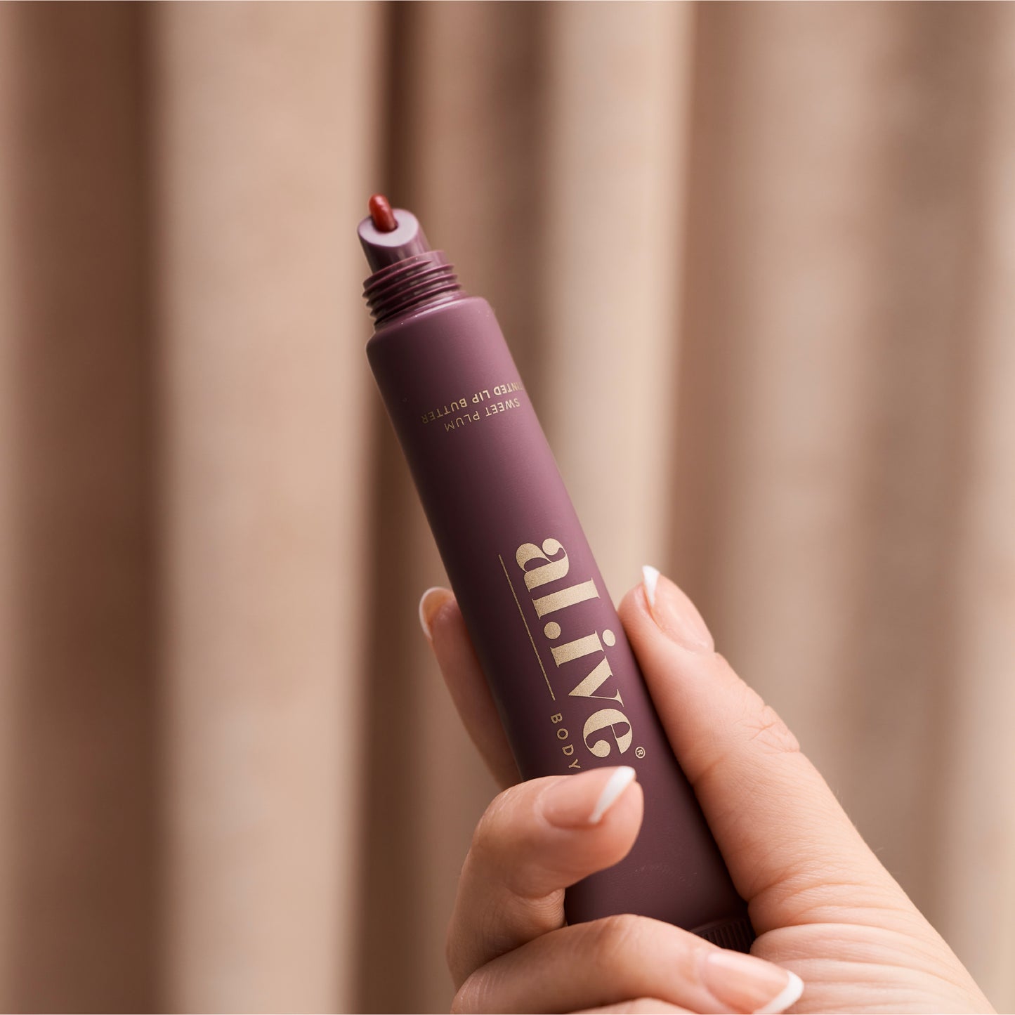 Al.ive tinted lip butter ornament - sweet plum