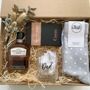 gift for dad this father's day of gentlemans jack, whiskey glass, cuvee chocolates and socks from little gift project